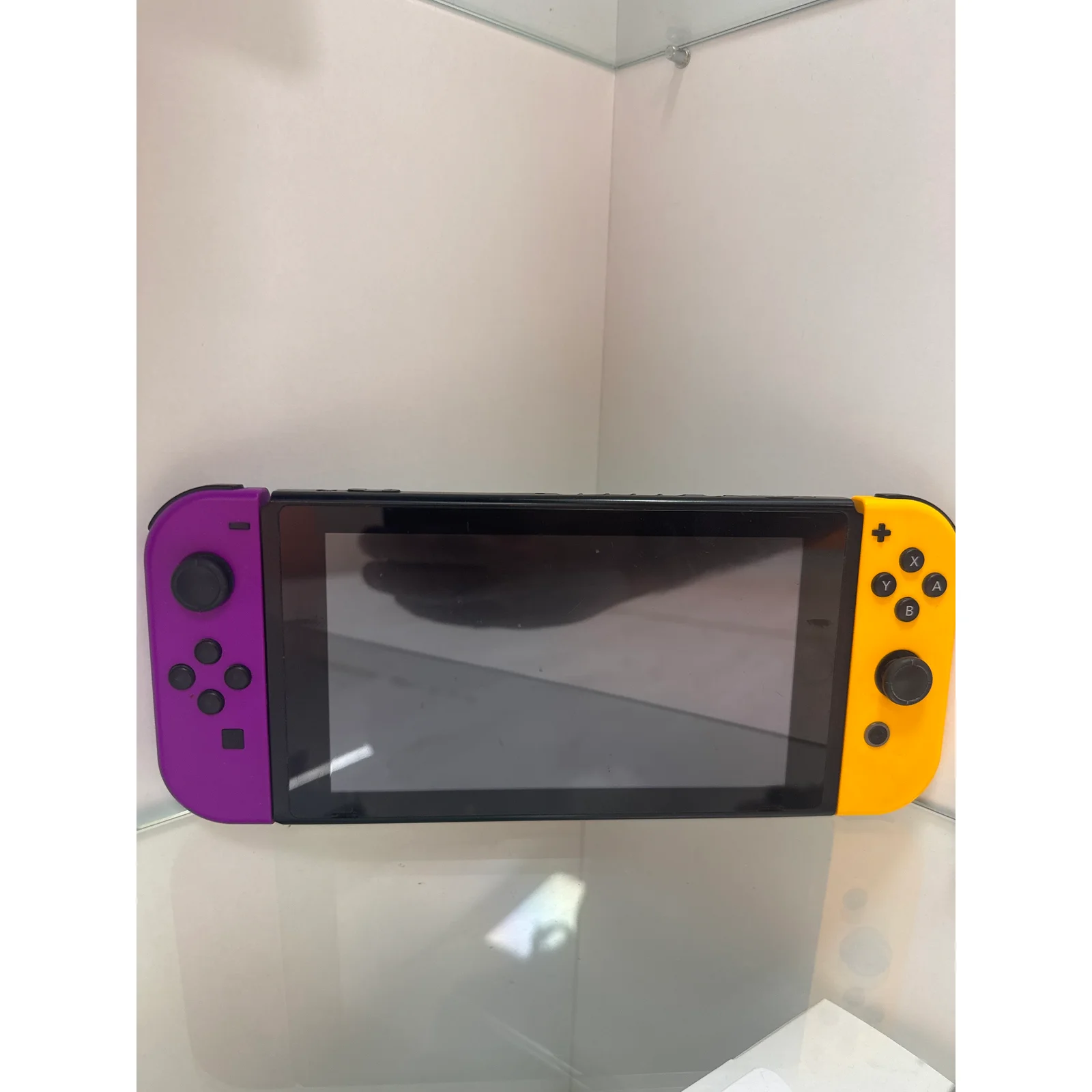CONSOLE NINTENDO SWITCH NOIR 32GB + 2 JOYCON VIOLET NEON & ORANGE NEON - 2